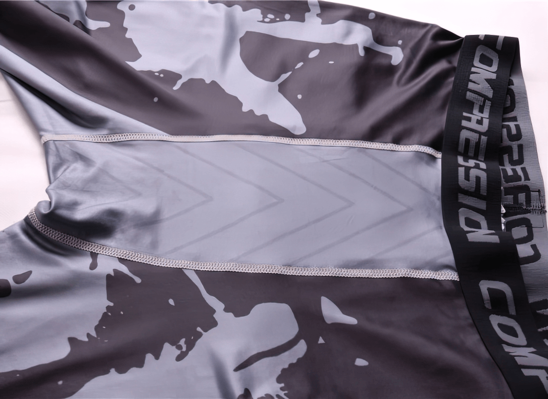 Gray men's compression leggings showcasing quick-dry material and stylish design.